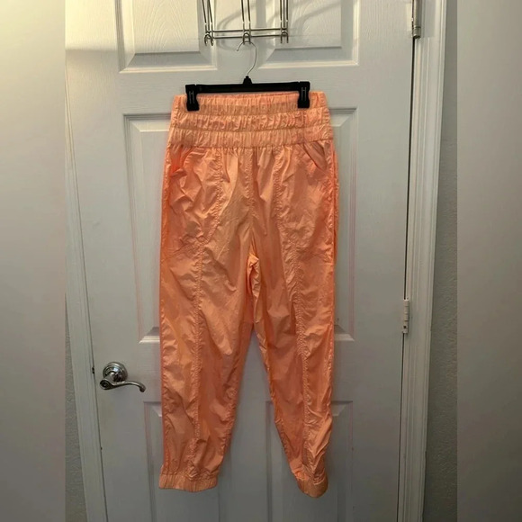 ! FREE PEOPLE MOVEMENT The Way Home Joggers in Papaya Punch Large - Picture 2 of 6